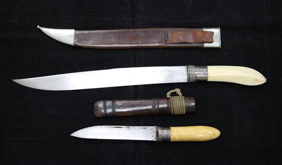 Two Burmese ivory handled dha, late 19th/early 20th century, 57cm (22.4in.) & 35cm (13.8in.)